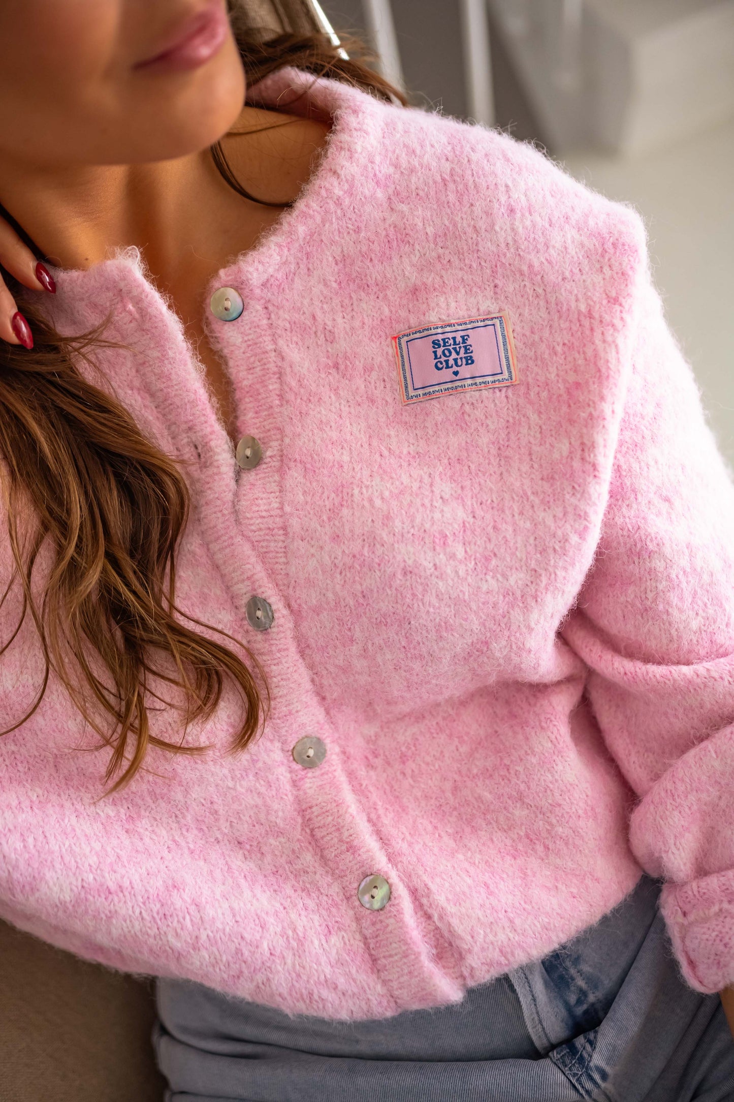 Cardigan matelassé rose chic pour looks superposés