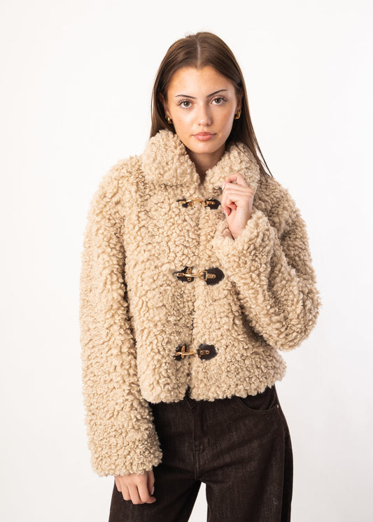 Veste douillette en peau de mouton bouclée