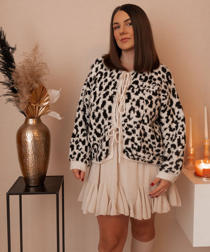 Robe chic beige d'inspiration fauteuil à bascule