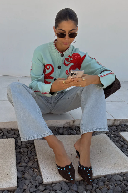 Cardigan côtier en maille confortable avec motif pieuvre et bordure contrastée