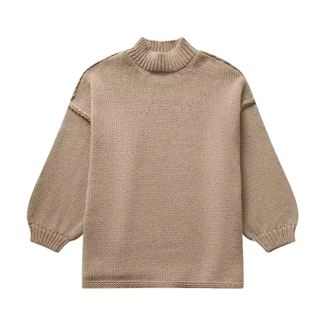 Pull à col roulé en maille douillette avec manches bouffantes tendance