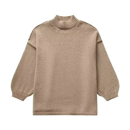 Pull à col roulé en maille douillette avec manches bouffantes tendance