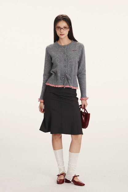 Cardigan en tricot cintré à taille fine avec design à panneaux