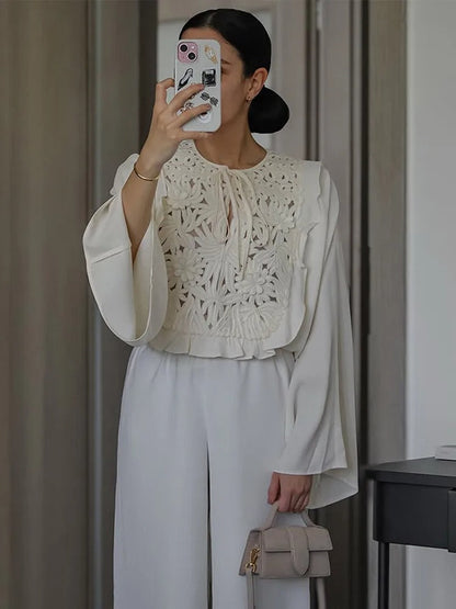 Chemise en maille décontractée à taille nouée avec détail en point ajouré