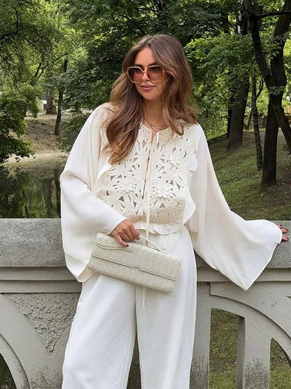 Chemise en maille décontractée à taille nouée avec détail en point ajouré