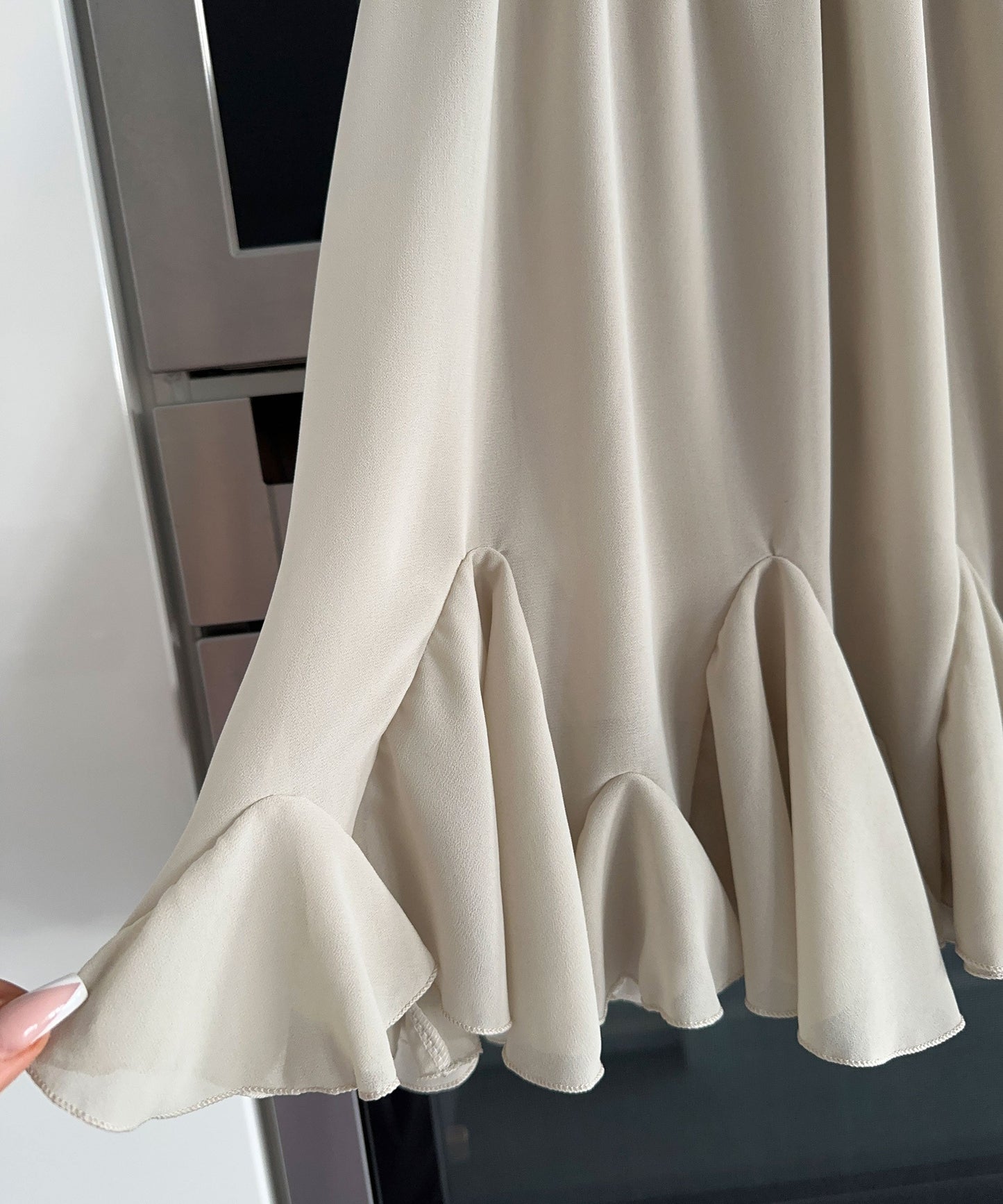 Robe chic beige d'inspiration fauteuil à bascule