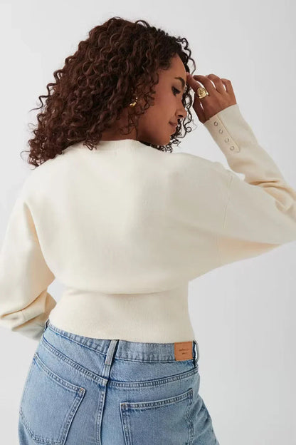 Blouse élégante boutonnée avec coupe droite polyvalente et détails aux poignets