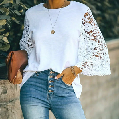 Elégant chemisier blanc en dentelle avec col rond et manches