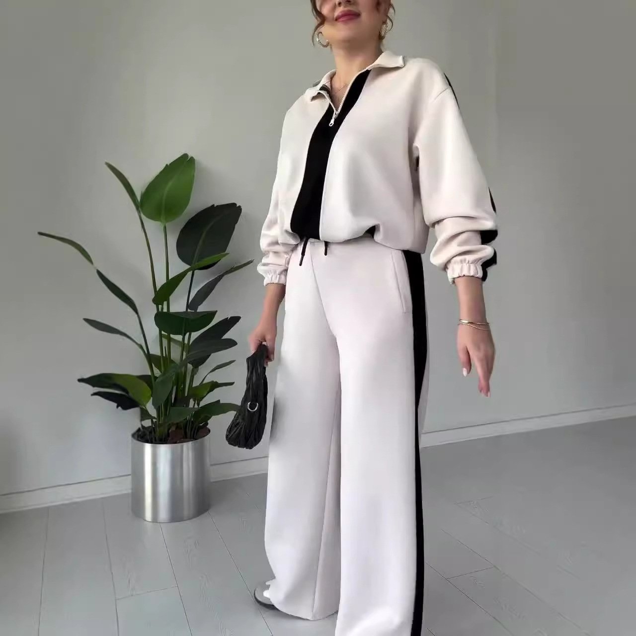 Ensemble chic 2 pièces avec haut à col à fermeture éclair et pantalon