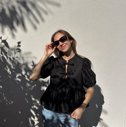 Blouse à manches bouffantes imprimé léopard avec détail nœud