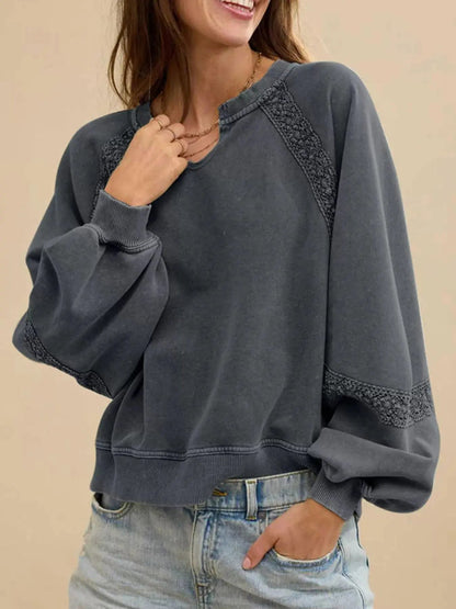 Sweat-shirt confortable avec détails en dentelle pour un look casual chic