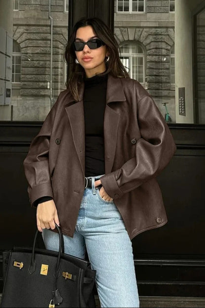 Manteau en cuir noir à double boutonnage avec col à revers