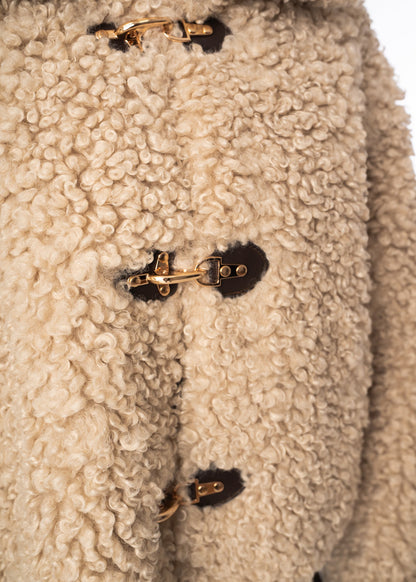 Veste douillette en peau de mouton bouclée