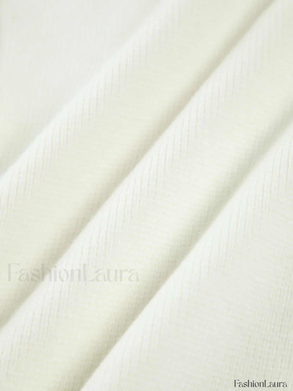 Cardigan en tricot avec ourlet déchiré et bordure perlée