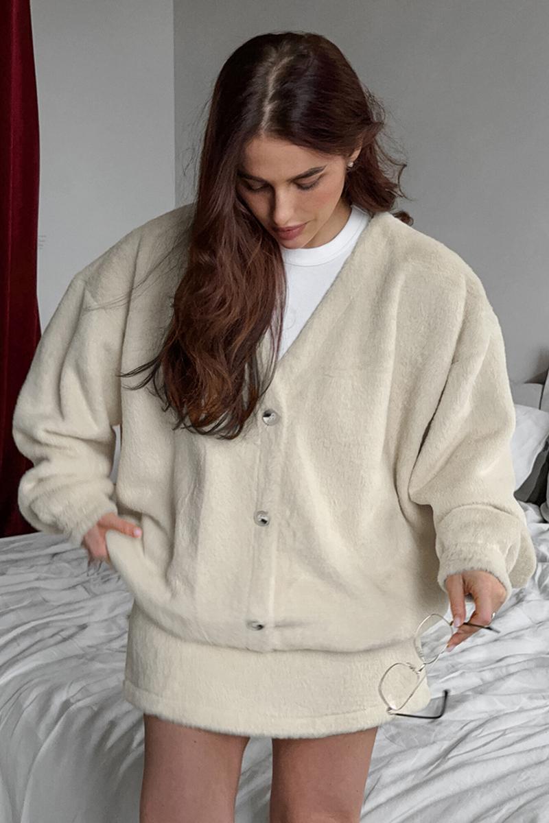 Ensemble chic manteau à manches longues et mini-jupe taille haute