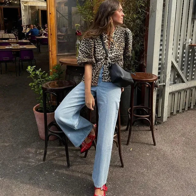 Blouse à manches bouffantes imprimé léopard avec détail nœud