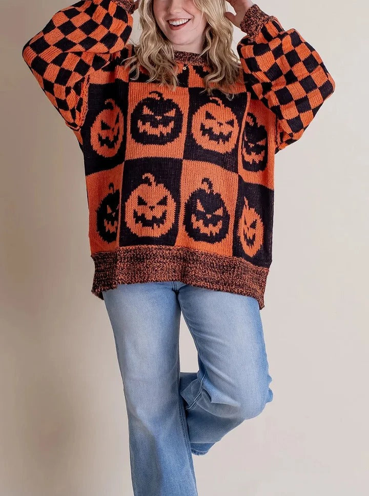 Pull en tricot à carreaux d'Halloween