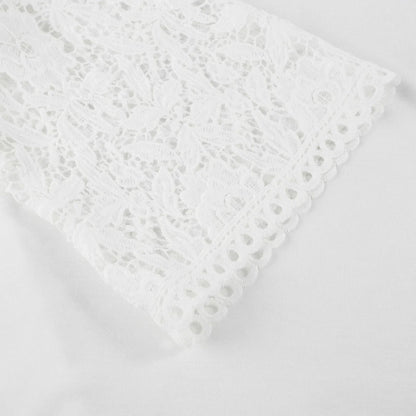 Elégant chemisier blanc en dentelle avec col rond et manches