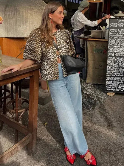 Blouse à manches bouffantes imprimé léopard avec détail nœud