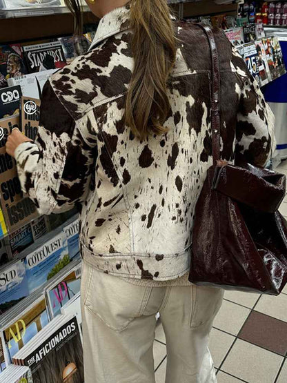 Veste à col cranté à imprimé vache avec boutons pression élégants