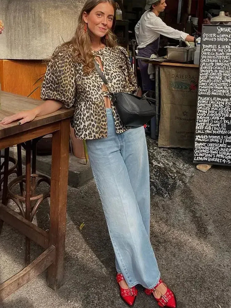 Blouse à manches bouffantes imprimé léopard avec détail nœud