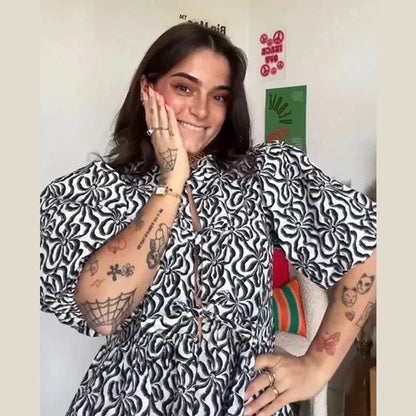 Blouse à manches bouffantes imprimé léopard avec détail nœud