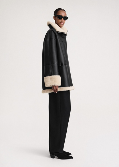 Manteau d'hiver douillet en fausse fourrure