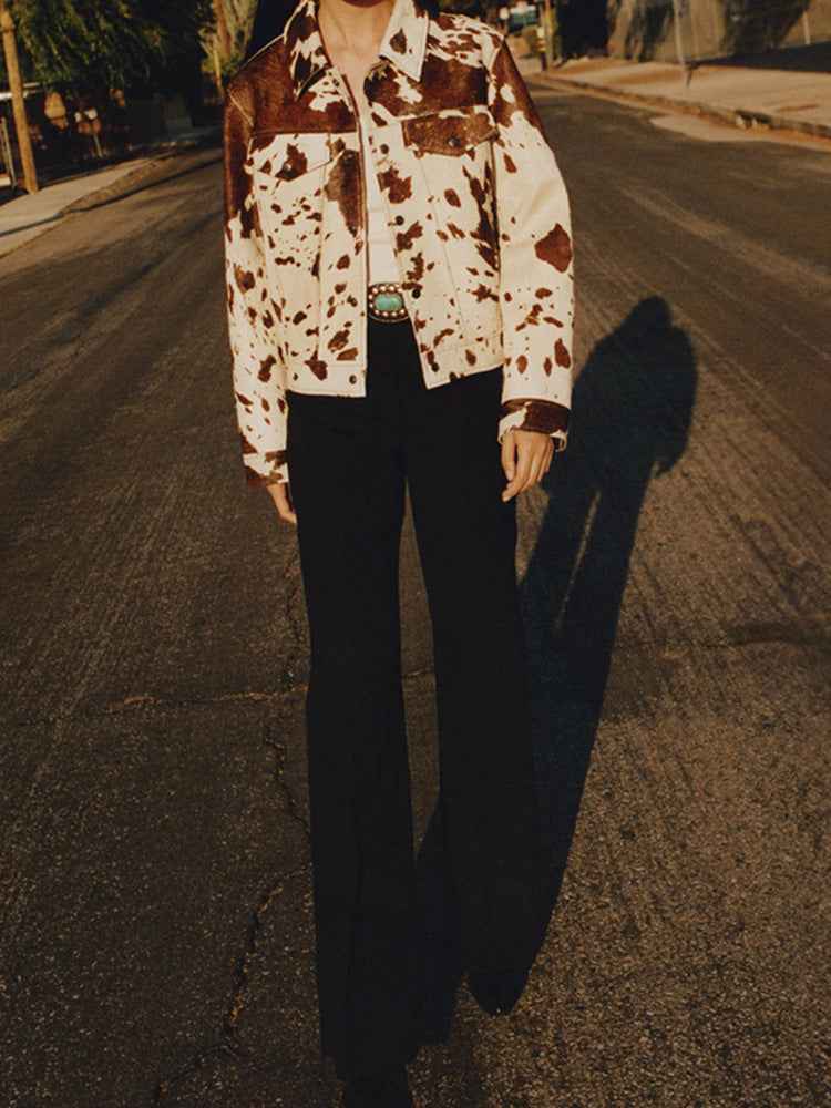 Veste à col cranté à imprimé vache avec boutons pression élégants