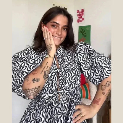 Blouse à manches bouffantes imprimé léopard avec détail nœud